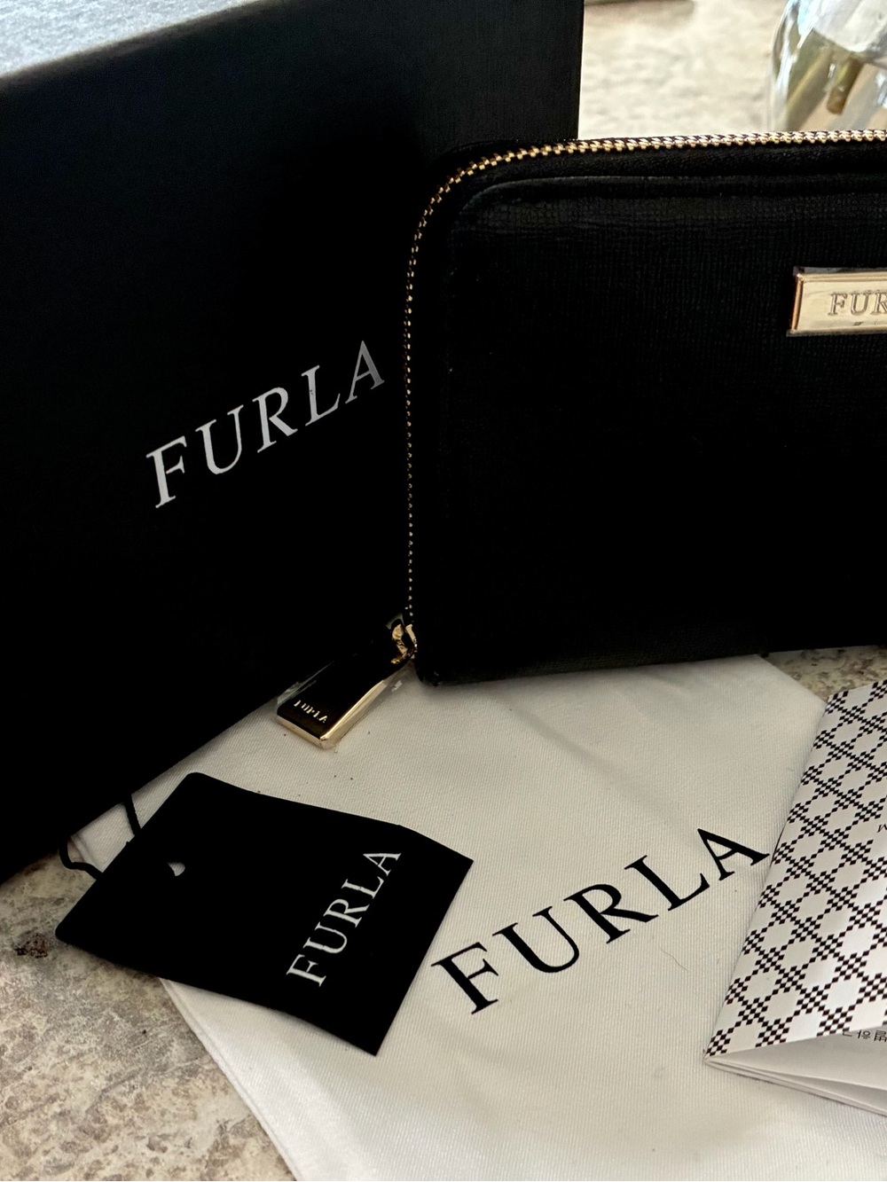 Furla Black Zip Wallet with Gold Hardware